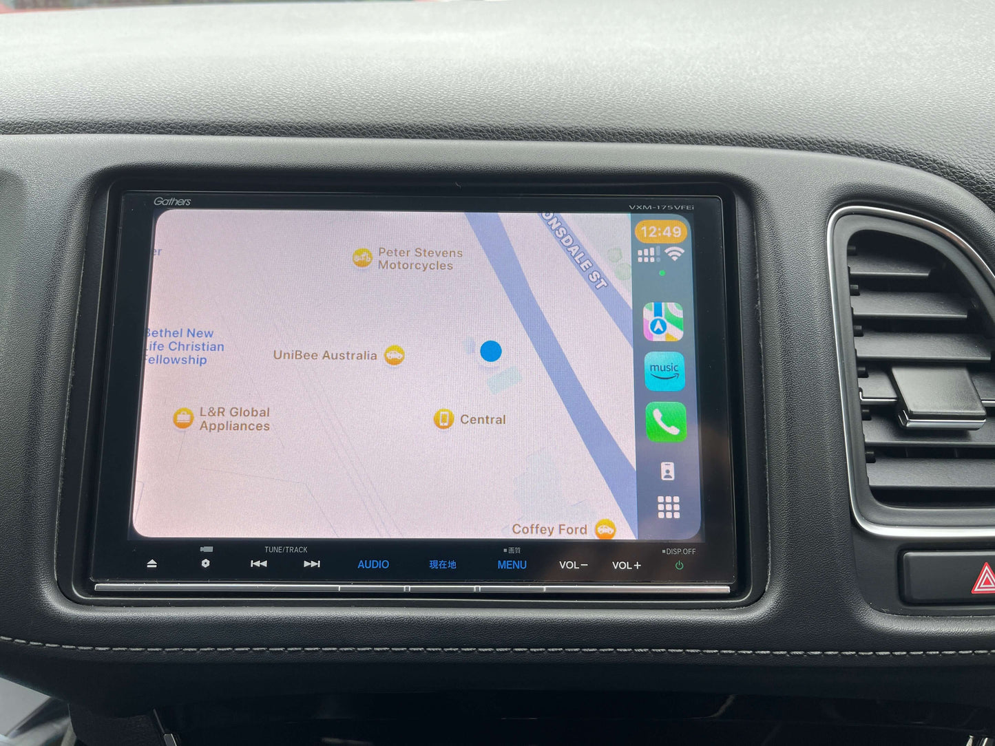 2016 Honda Vezel HR-V Hybrid Display screen showing a navigation map in a vehicle interior, with location markers and menu options visible.