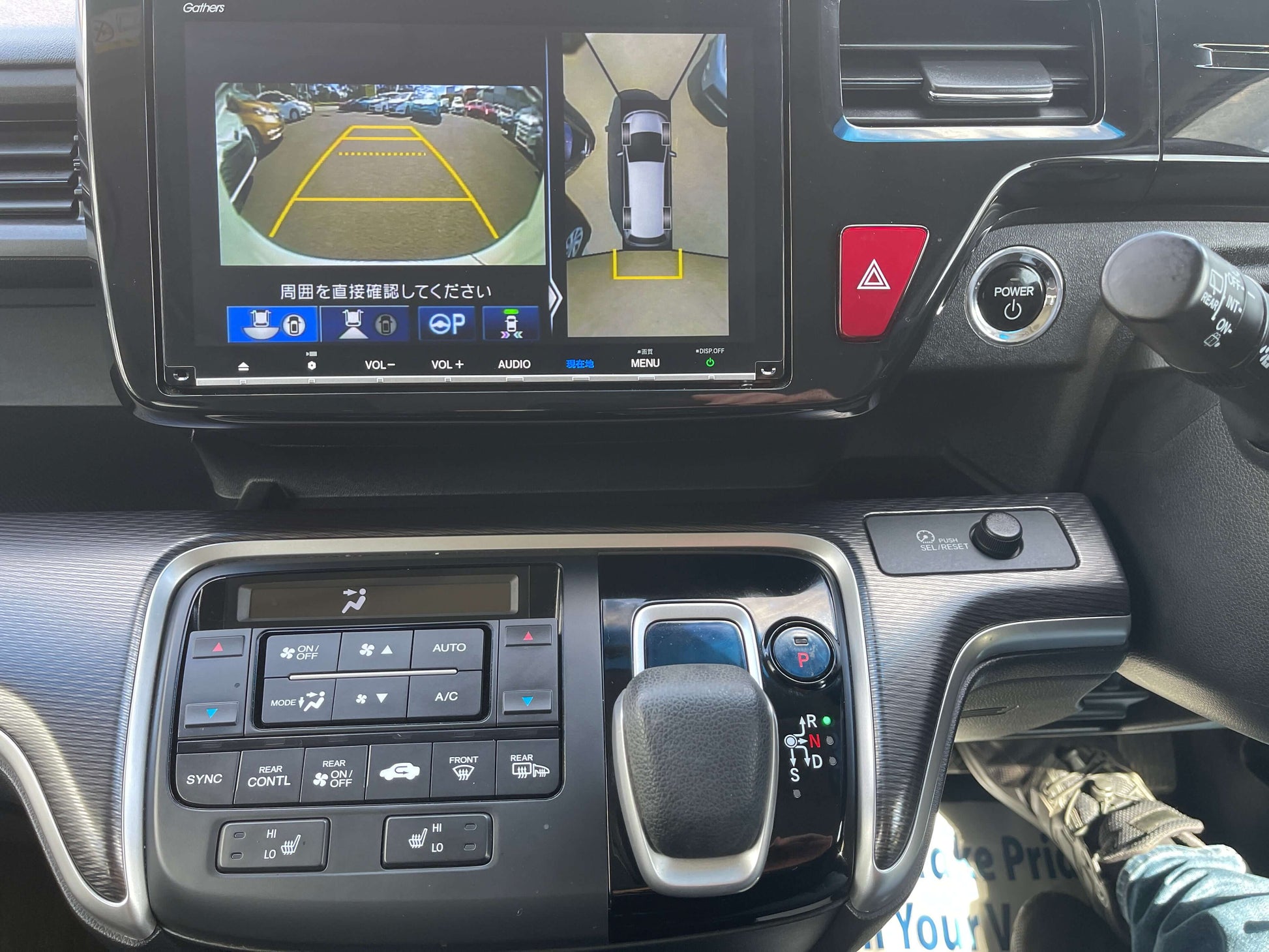 Interior view of 2018 Honda Stepwgn 2.0 Spada Hybrid G Honda Sensing with dashboard display and control panel.