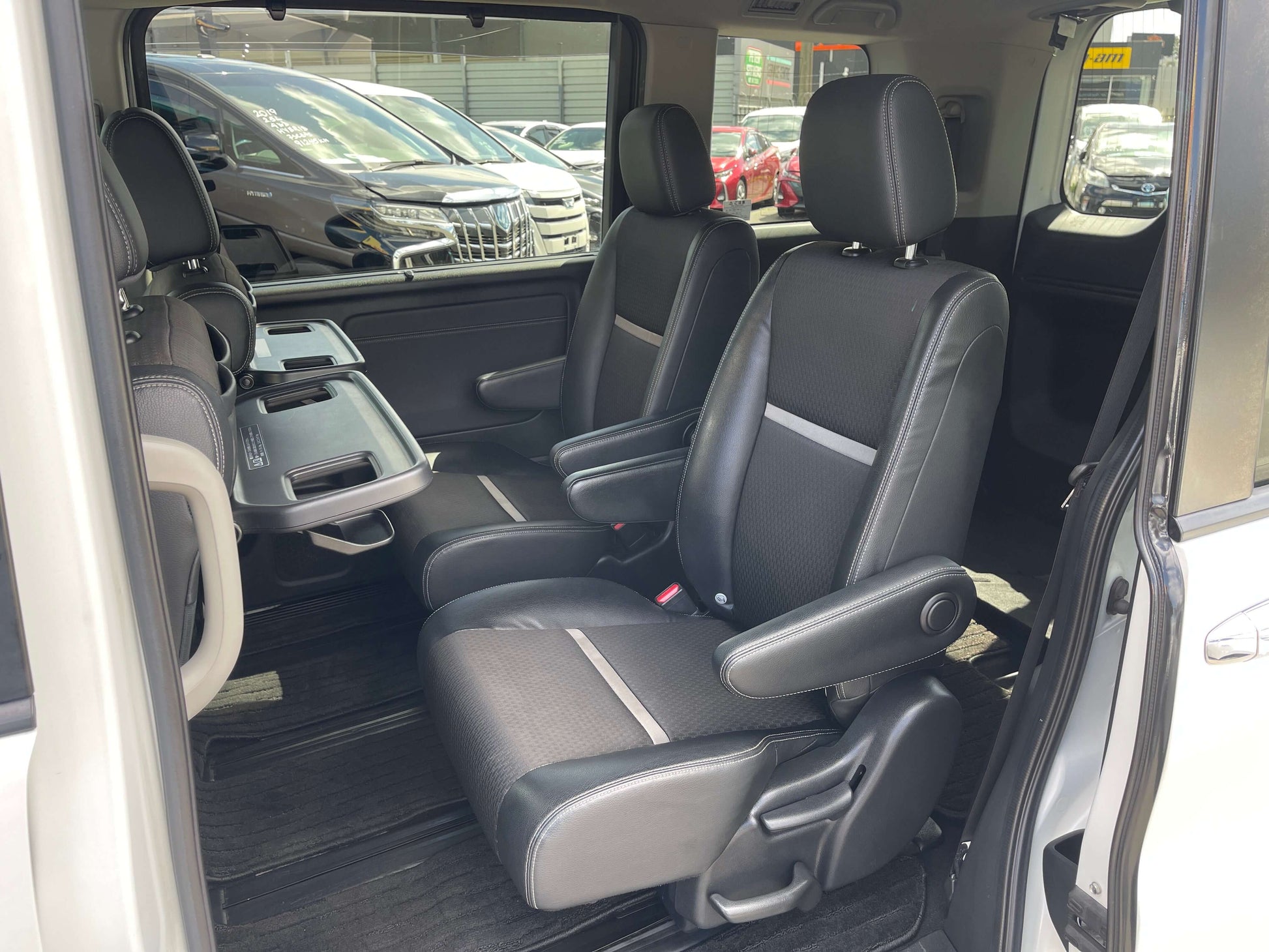 Interior seating of 2018 Honda Stepwgn 2.0 Spada Hybrid G Honda Sensing with 7 seats and modern design.