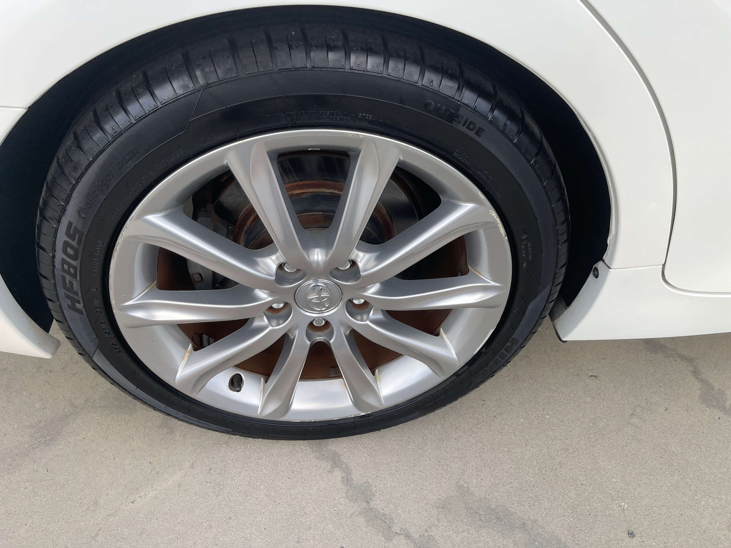 2011 Toyota Mark X V6 3.5L 350S Sport Sedan wheel close-up showing alloy rim and tire detail