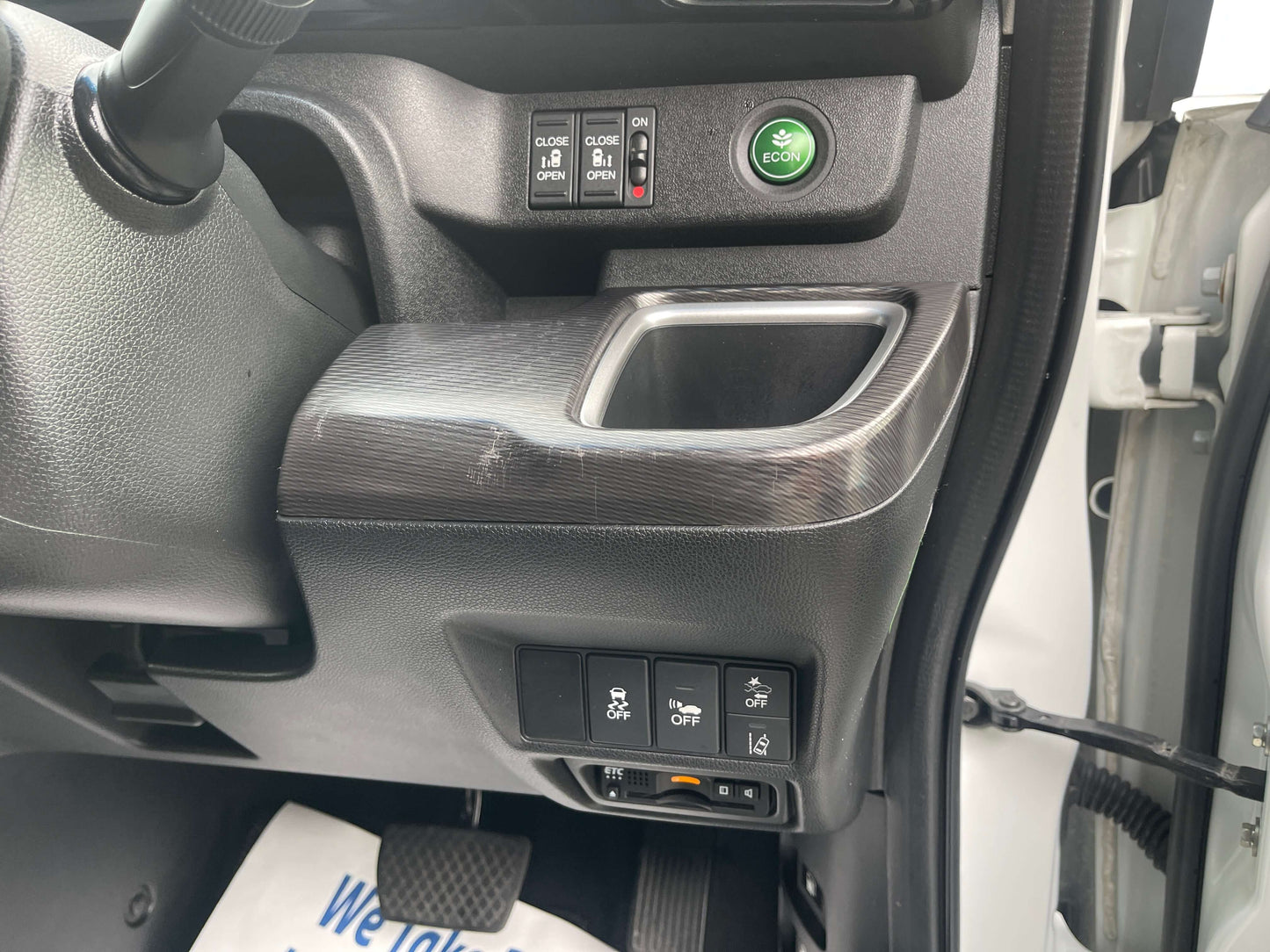 Interior view of the 2018 Honda Honda Stepwgn 2.0 Spada Hybrid G Honda Sensing showing control panel and features.