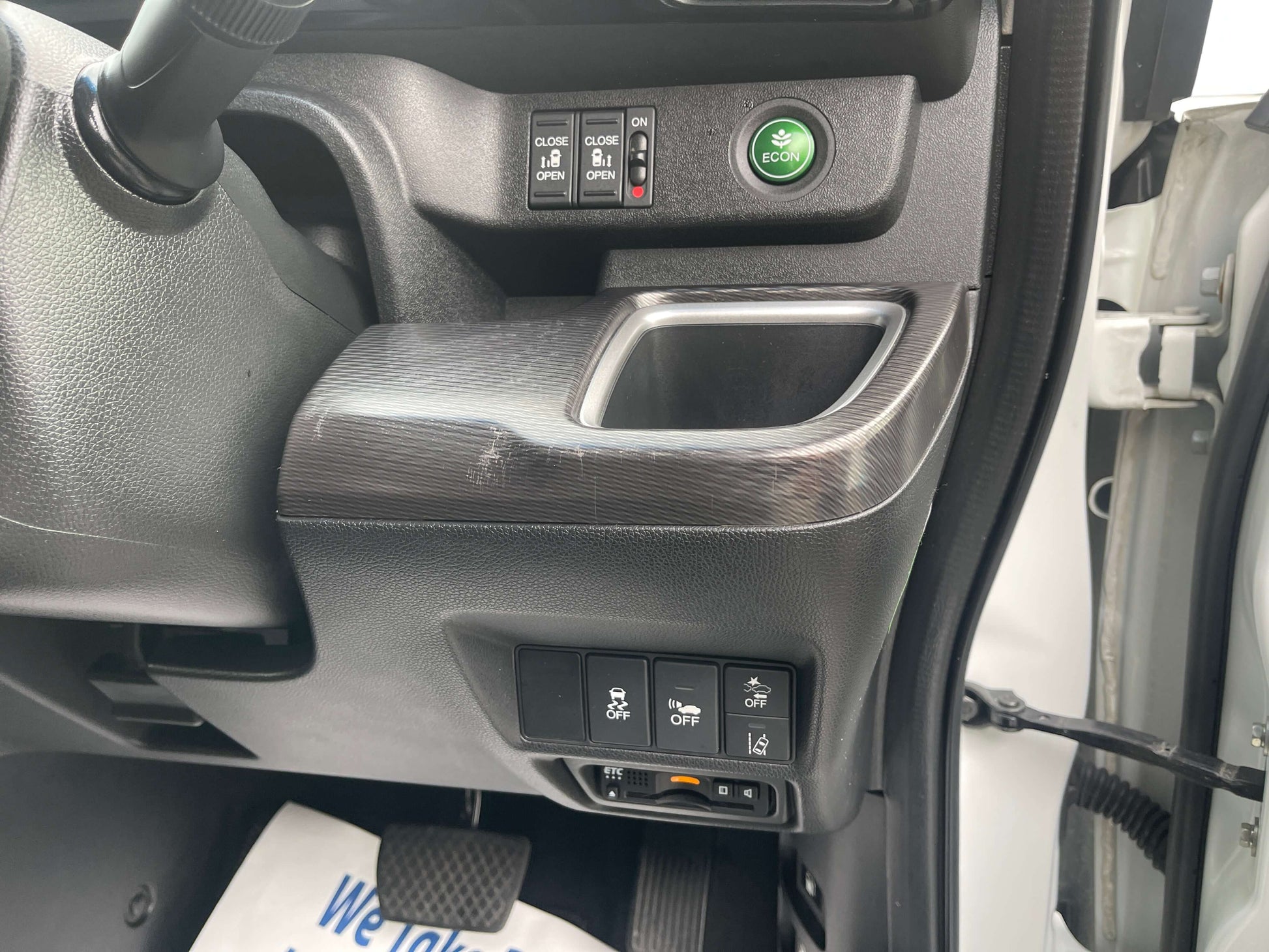 Interior view of the 2018 Honda Honda Stepwgn 2.0 Spada Hybrid G Honda Sensing showing control panel and features.