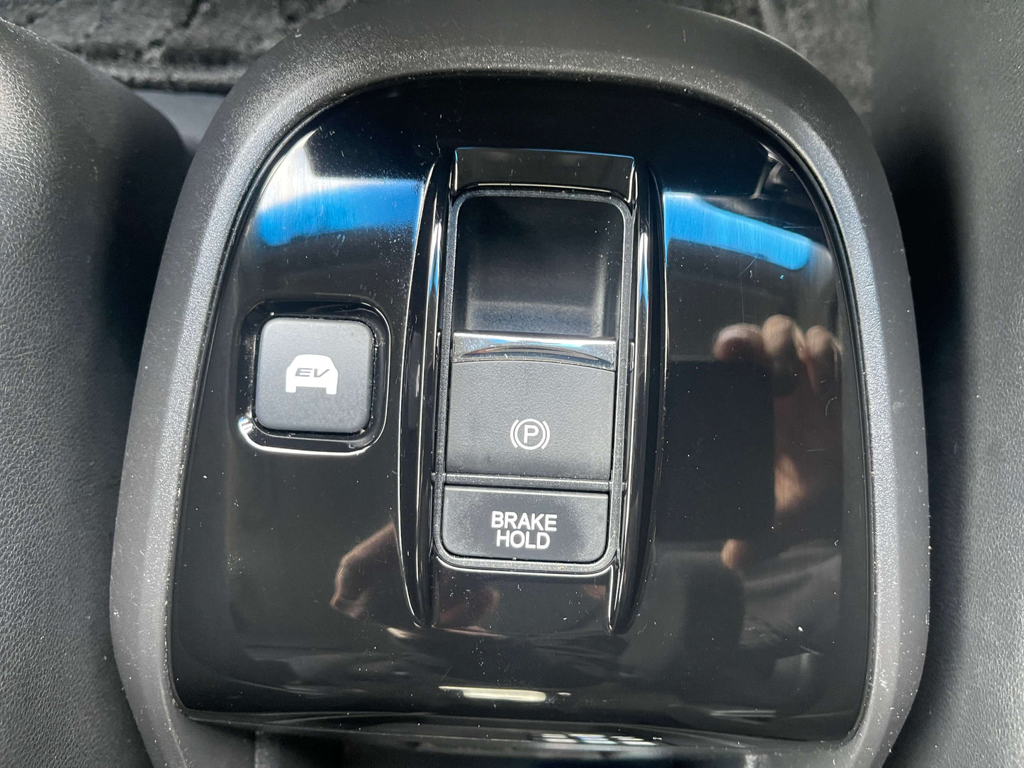 Controls for EV mode and Brake Hold in the interior of a 2018 Honda Honda Stepwgn 2.0 Spada Hybrid G Honda Sensing.