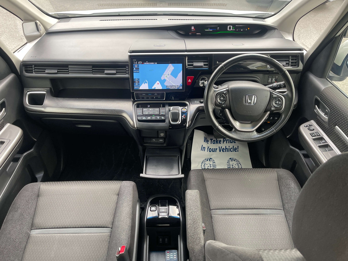 Interior view of 2018 Honda Honda Stepwgn 2.0 Spada Hybrid G Honda Sensing showing dashboard and seating layout.