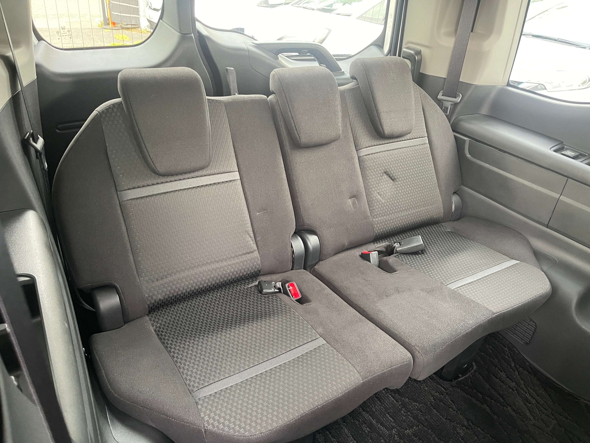 Interior view of the 2018 Honda Honda Stepwgn 2.0 Spada Hybrid G Honda Sensing showcasing spacious 7-seater arrangement.