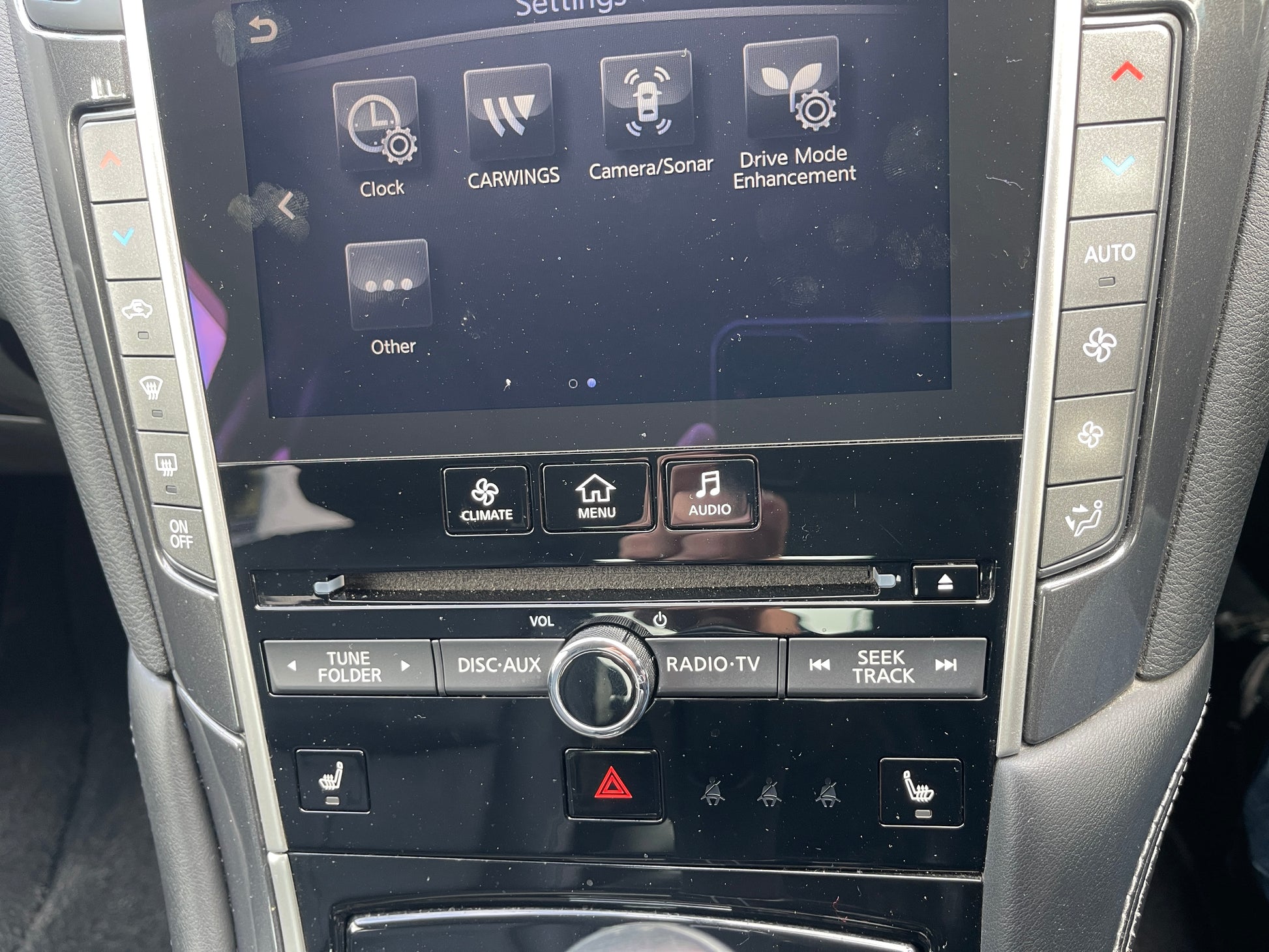 Dashboard controls and settings display of a 2016 Nissan Skyline V6 3.5L Hybrid 350GT Sport Sedan.