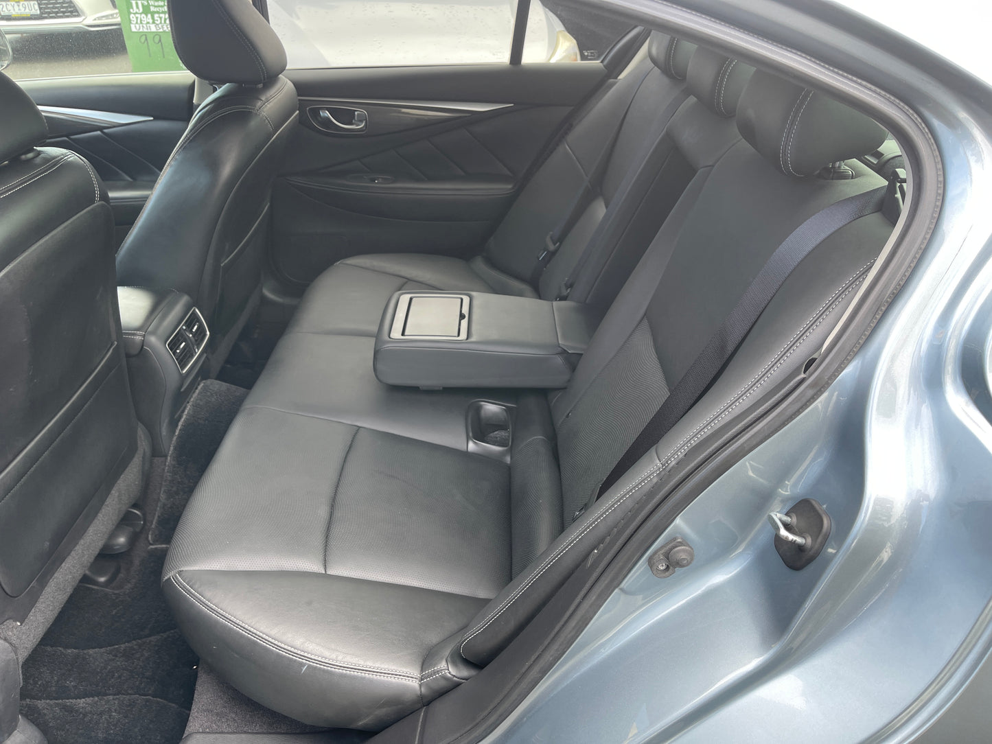 2016 Nissan Skyline V6 3.5L Hybrid interior view showing rear leather seating