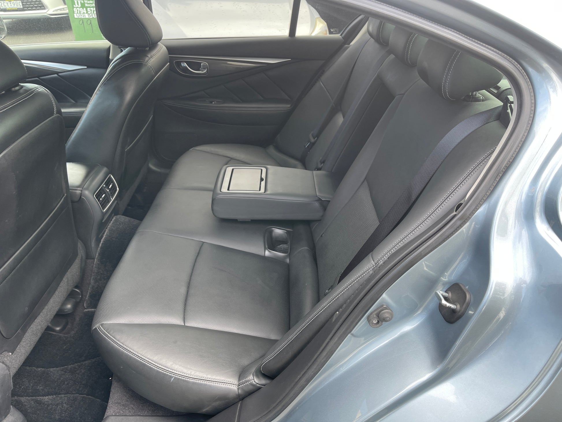 2016 Nissan Skyline V6 3.5L Hybrid interior view showing rear leather seating