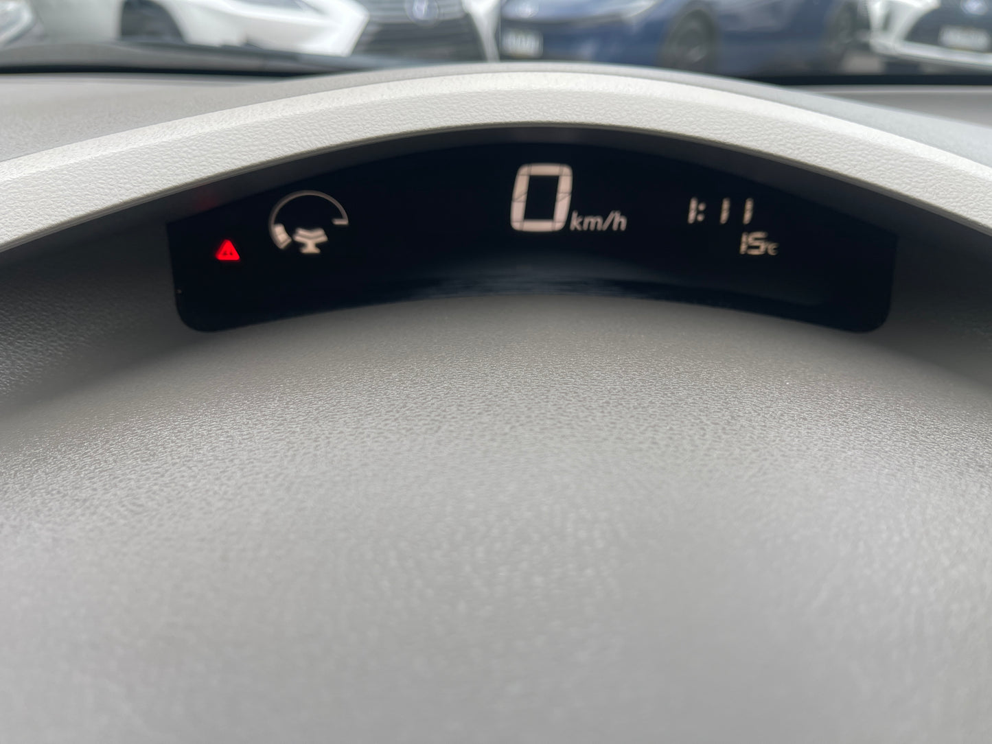 Dashboard display of 2013 Nissan Leaf 24kW G-Edition Full Electric indicating 0 km/h speed.