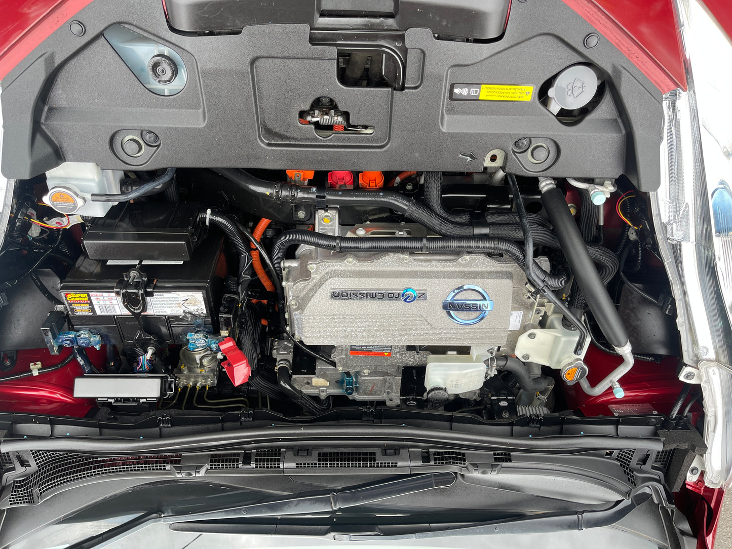 2013 Nissan Leaf 24kW G-Edition Full Electric engine compartment view showing electric motor and components.