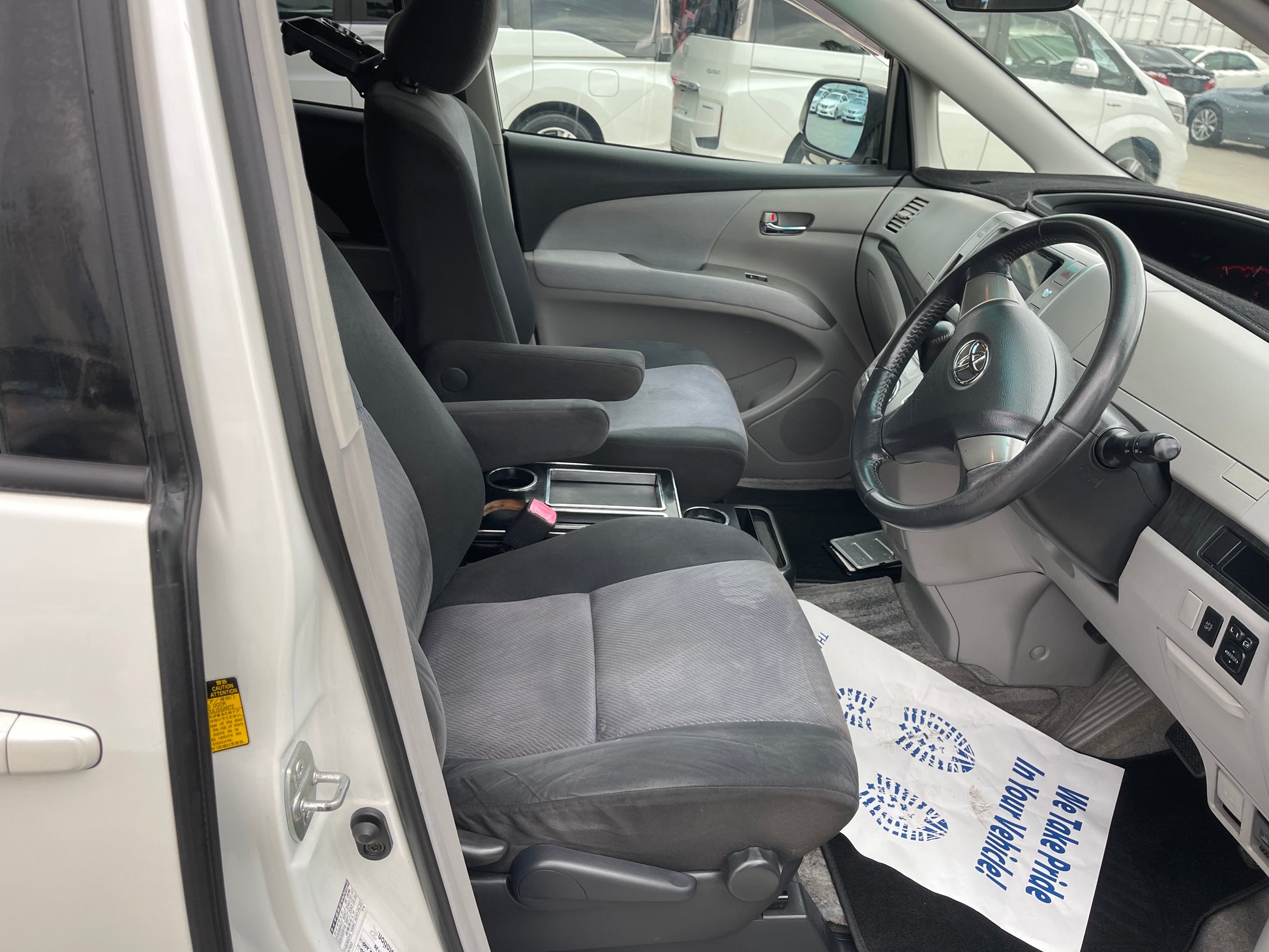 Interior view of 2006 Toyota Estima Aeras V6 3.5L showing spacious seating and driver dashboard.
