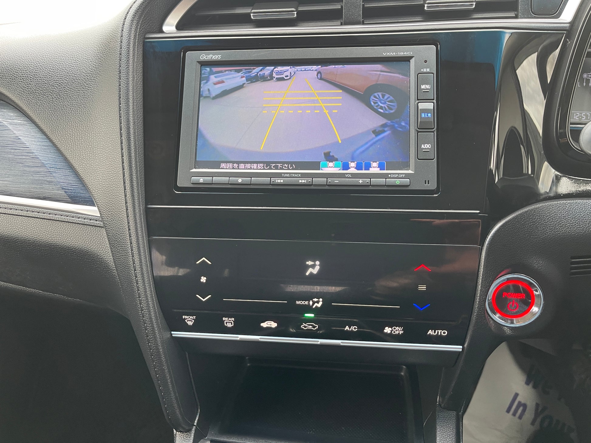 2018 Honda Shuttle 1.5 Hybrid dashboard display featuring reverse camera and control panel.