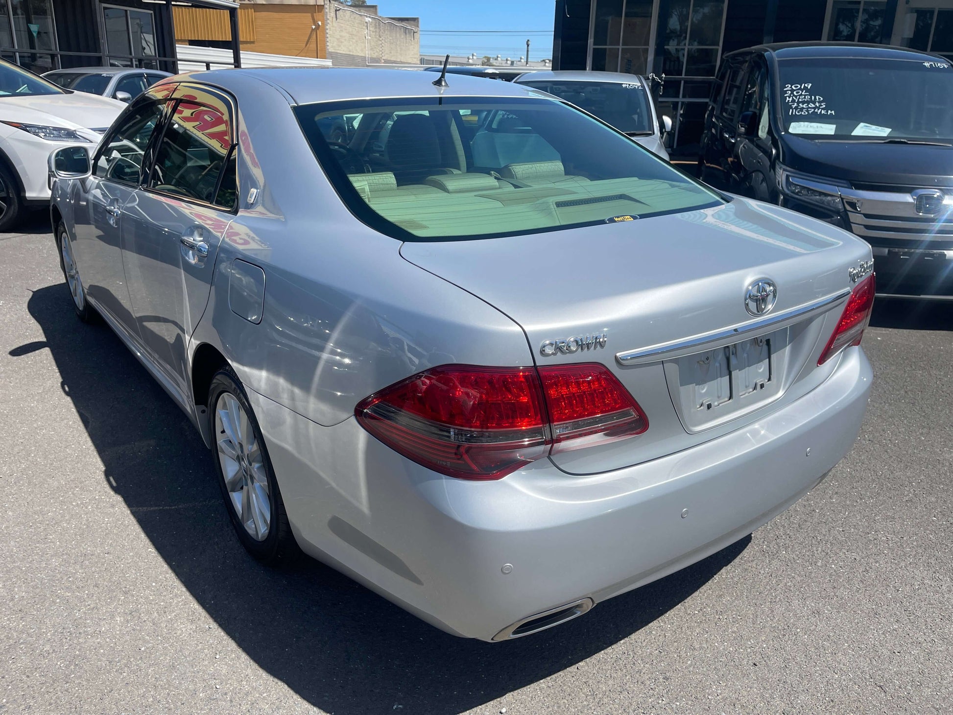 2008 Toyota Crown V6 3.0L Royal Saloon Luxury Sedan rear view in silver color parked outdoors