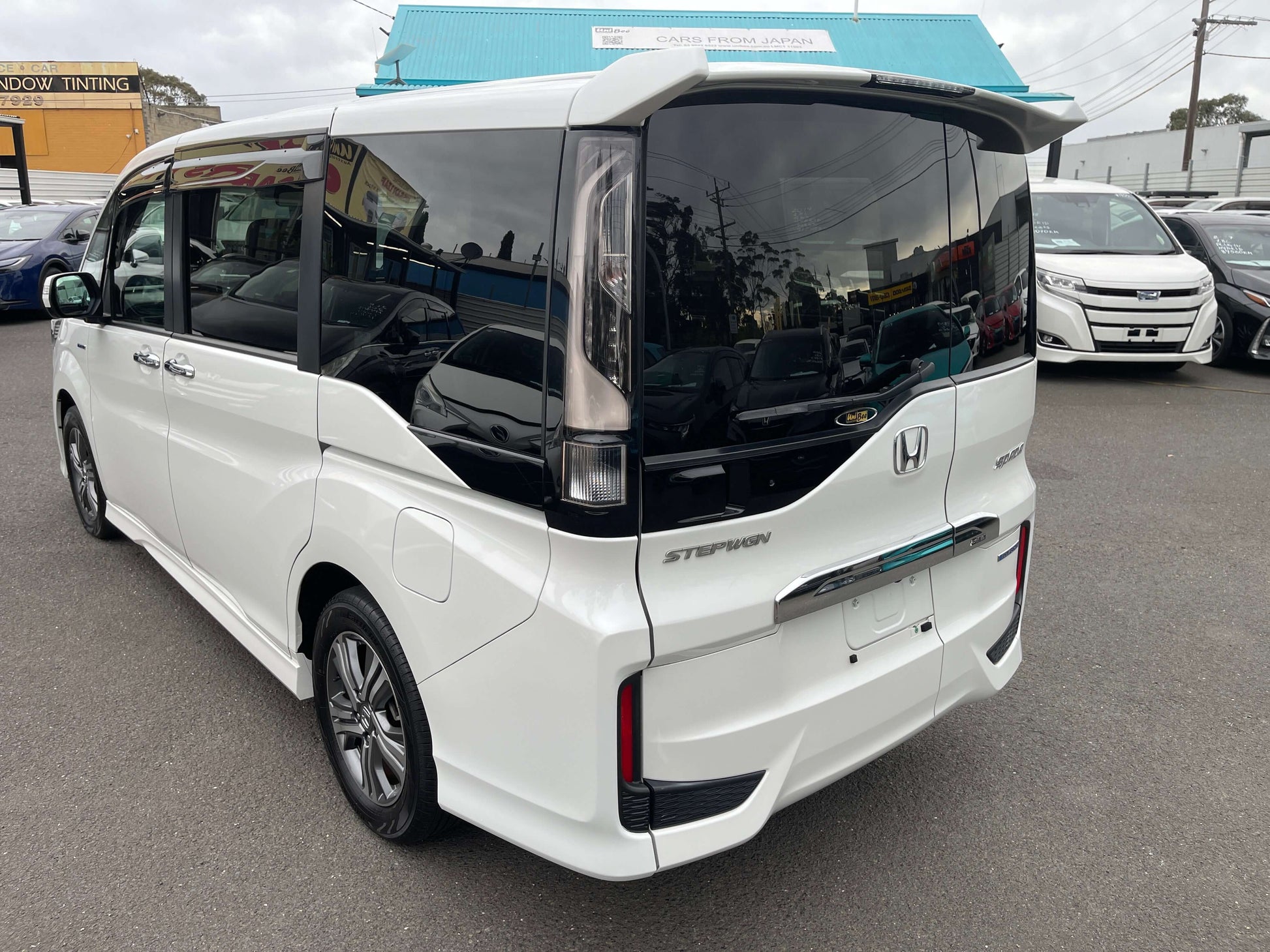 2018 Honda Honda Stepwgn 2.0 Spada Hybrid rear view, showcasing sleek design and modern features.