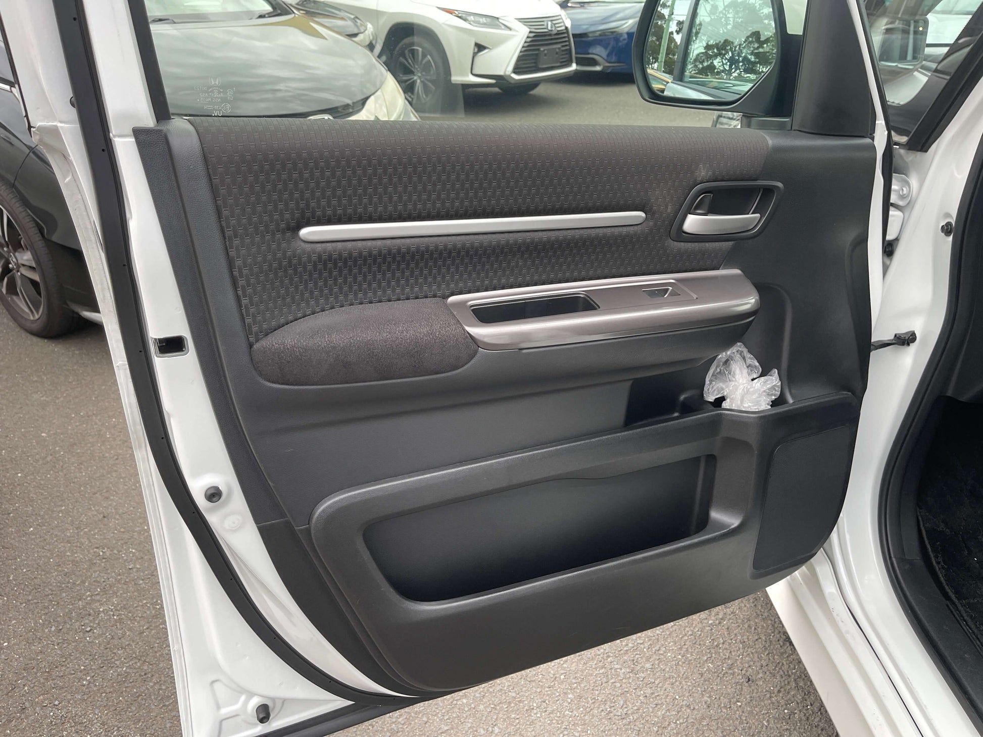 2018 Honda Honda Stepwgn 2.0 Spada Hybrid interior door panel showing modern design and features